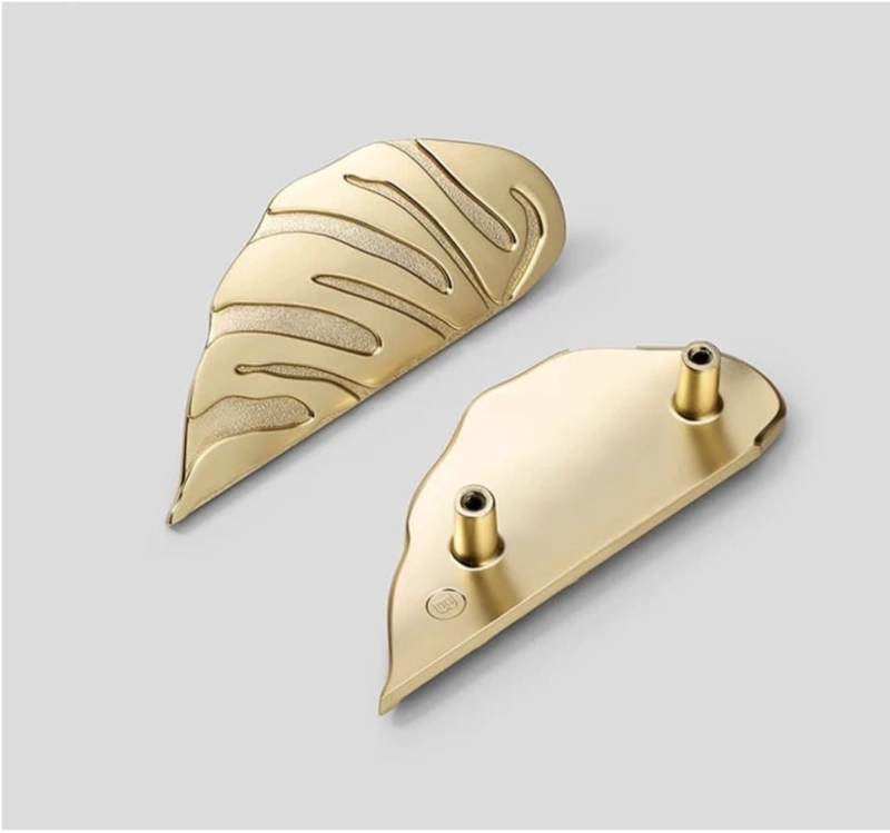 uchwyty meblowe monstera gold złoty.png